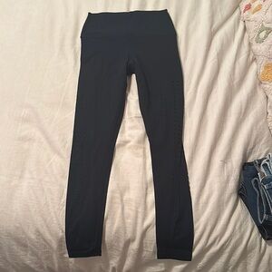 Glyder black leggings with holes detailing the sides
